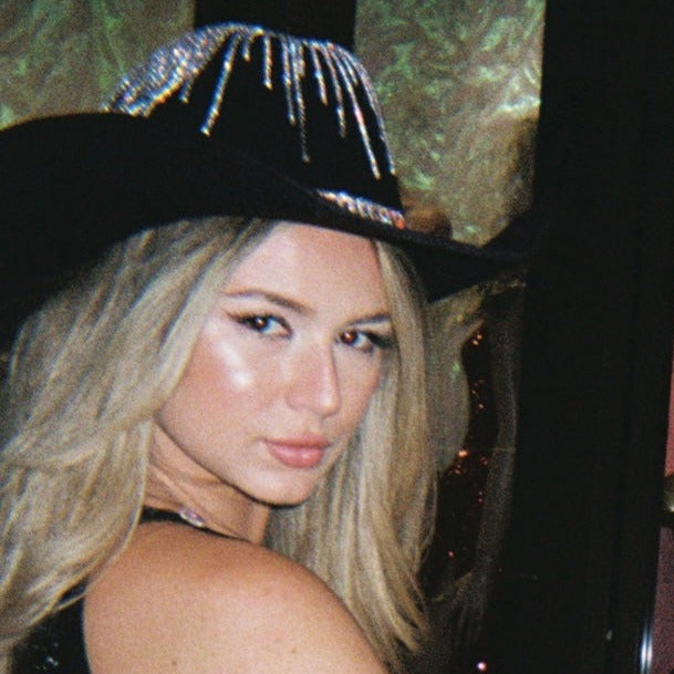 HUSTLER in brown and black